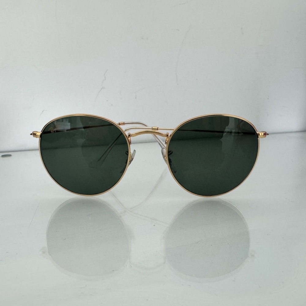 Round Gold Frame Sunglasses with Dark Lenses